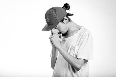 grayscale photo of man wearing crew-neck shirt thumbnail