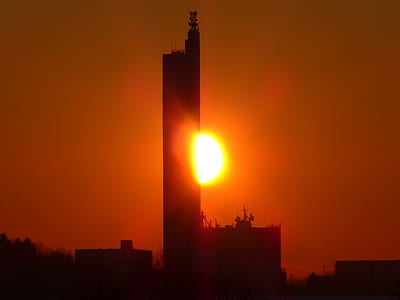 silhouette photography of high-rise building thumbnail