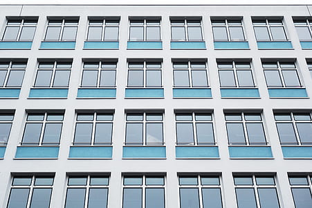 white concrete building at daytime thumbnail