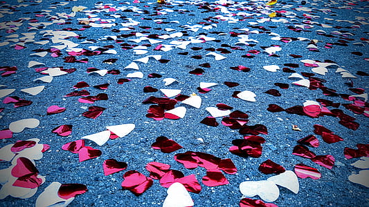 white and pink cutout foil hearts on ground thumbnail