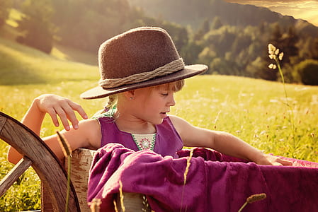 girl sitting on wagon thumbnail