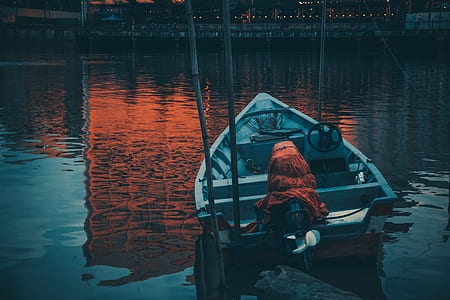 jon boat on body of water thumbnail