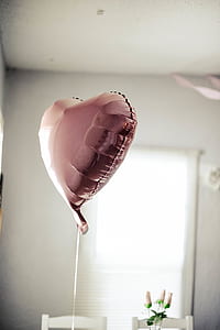 inflatable floating pink foil heart balloons inside room thumbnail