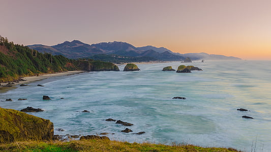 sea near mountain thumbnail