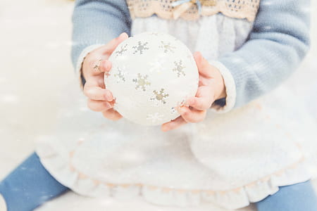 person holding white snowball thumbnail