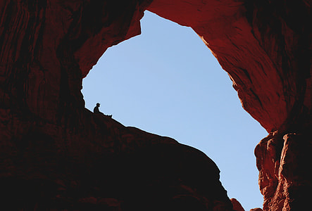 person top of rock formation thumbnail