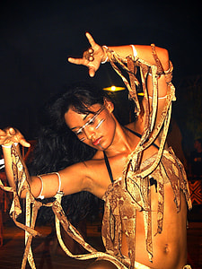 woman wearing brown costume at nighttime thumbnail