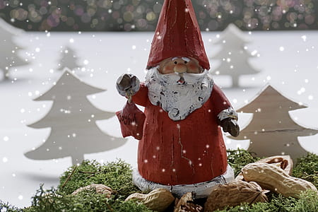 close-up photo of Santa Claus wooden figurine thumbnail