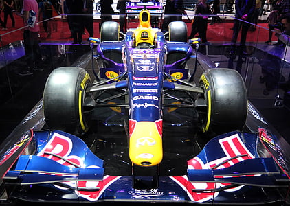 blue and yellow F1 car on black surface thumbnail
