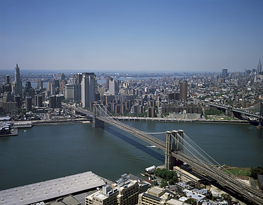 brooklyn bridge under blue skies aerial photography thumbnail