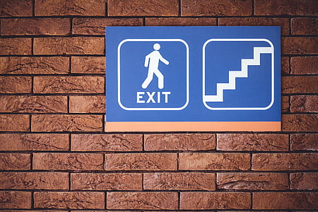 Exit signage on wall thumbnail