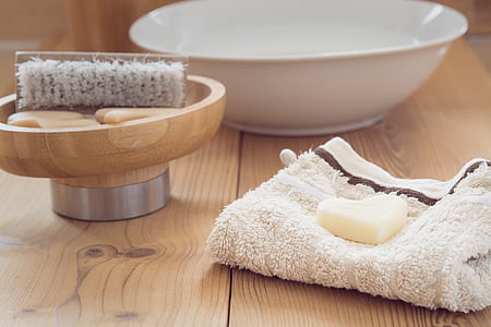round white ceramic bowl beside brush thumbnail
