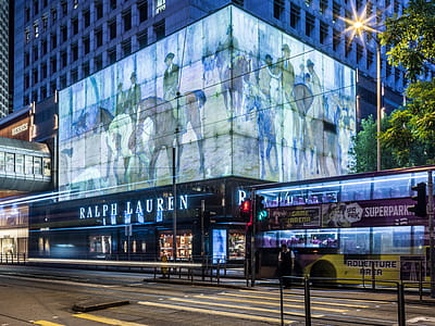 Double Decker Bus In Front Of Building thumbnail