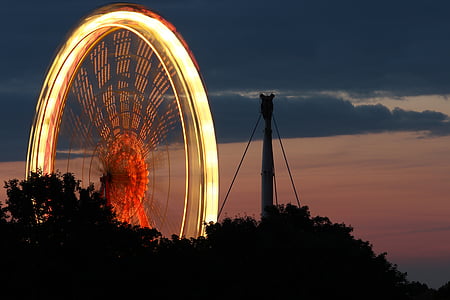 time lapse photography of Ferris wheel at night thumbnail
