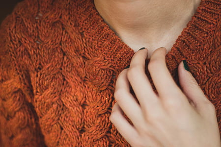woman wearing brown sweater thumbnail