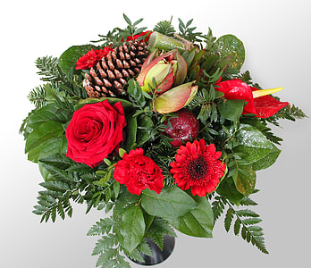 red roses, gerbera daisies, and brown pinecone centerpiece thumbnail