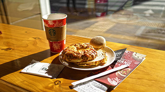selective focus photography of bread on brown table thumbnail