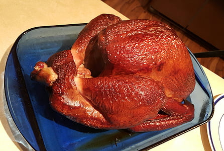 roasted chicken on blue glass casserole thumbnail