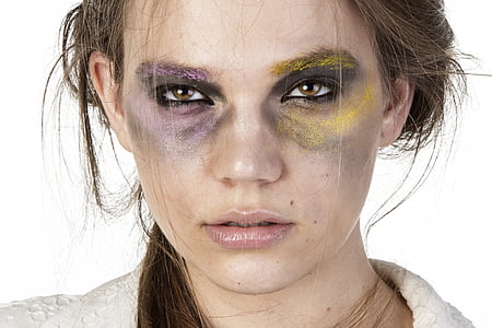 closeup photography of woman with face paint thumbnail