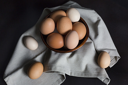 brown and white eggs on brown bowl thumbnail