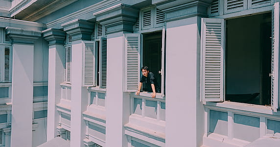 Man Looking Out The Window thumbnail