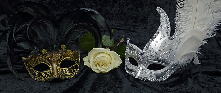 photo of gold and silver mask beside white rose flower thumbnail