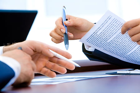 person discussing in front of table thumbnail