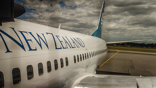 white New Zealand airliner at railway thumbnail