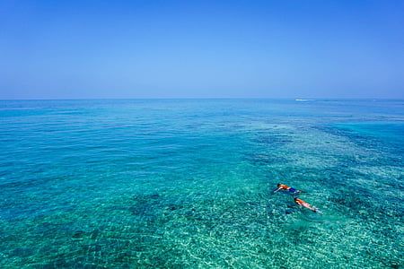two people on body of water thumbnail