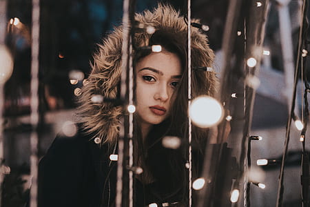 selective focus photography of woman in fur coat thumbnail