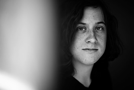 grayscale photo of woman wearing black shirt thumbnail