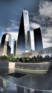 gray concrete building at daytime thumbnail