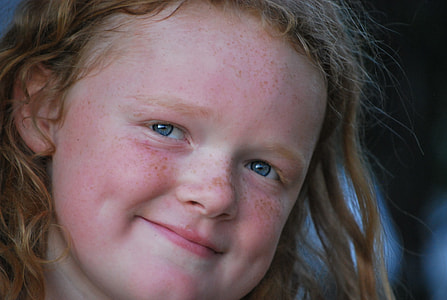 selective focus photography of a girl thumbnail