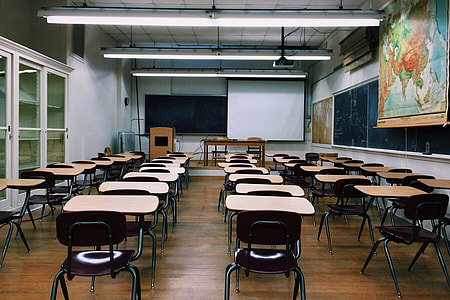 School classroom with tables and chairs thumbnail