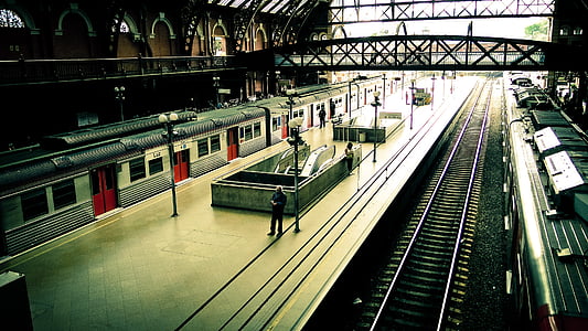 person standing on train station thumbnail