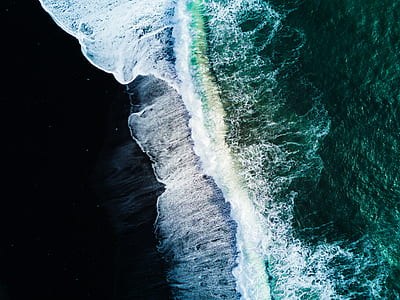 high angle photography of seawaves during daytime thumbnail