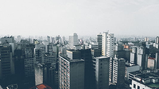 High Rise Building Under Cloudy Sky at Daytime thumbnail