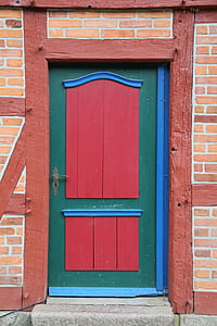 green and red wooden door thumbnail