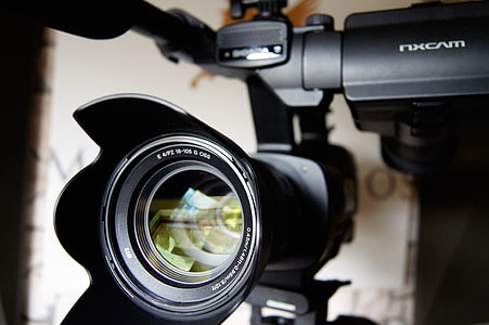 black DSLR camera thumbnail