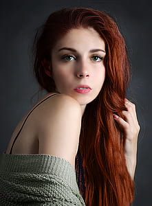closeup photography of woman wearing gray knit top and black bra strap thumbnail