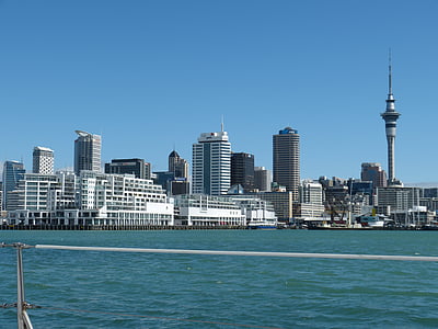 white high-rise building near the body of water thumbnail