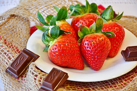 red strawberries on white plate thumbnail