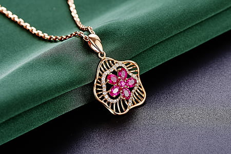 gold-colored purple gemstone pendant thumbnail