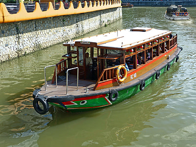 photo of green and brown barge during daytime thumbnail