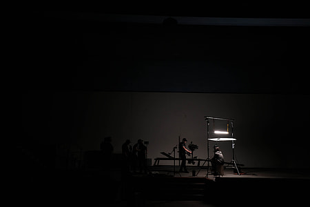 people inside dimmed studio room thumbnail