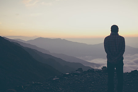 A man enjoys the view of mountains in Minami Alps, Japan thumbnail
