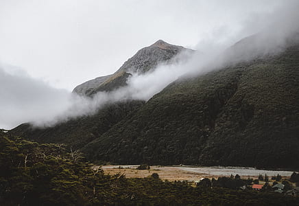 photography of mountain and river thumbnail