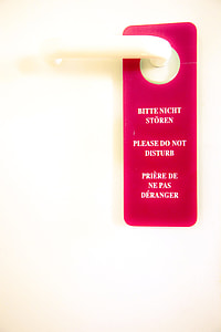 red door tag on door lever thumbnail