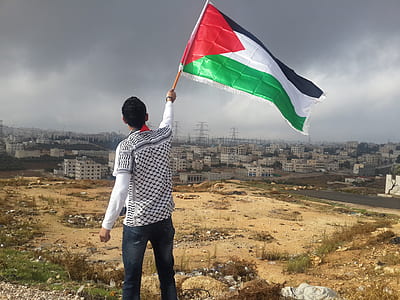 man holding flag thumbnail