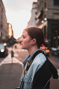selective focus photography of woman on road thumbnail